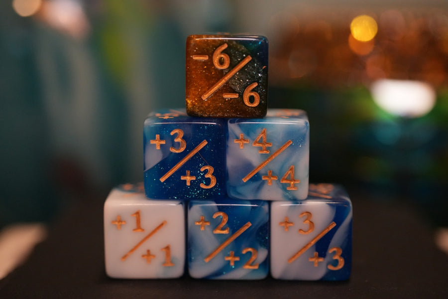 Milky Way Blue and Starry Orange + / - Counter Dice – 12 Pack