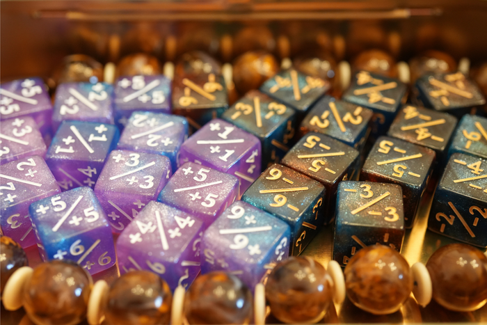 Starry Sky Blue and Orange + / - Counter Dice – 12 Pack